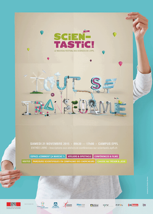 Des mains tiennent un exemplaire de l'affiche 2015 de Scientastic
